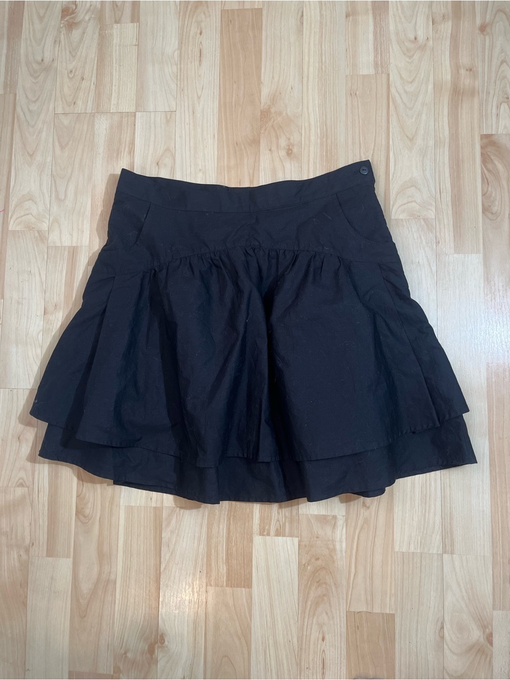 Zara black skirt features a ruffled, flounced design with pockets Small